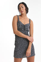 Load image into Gallery viewer, Show your best assets in this abstract dot printed, body con mini dress. Featuring ruffled straps, a tied sweetheart neckline and smocking throughout, find yourself looking for this dress on those sweet yet sexy occasions life may bring.