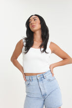 Load image into Gallery viewer, Slightly cropped for those high-waisted bottoms, this ivory colored, ribbed tank will help you achieve any effortless look. Featuring thick straps and a sweetheart neckline, easily use this staple for a dressed up or down look.