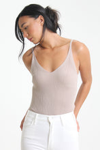 Load image into Gallery viewer, Made in a classic taupe color, this spaghetti strap bodysuit easily tucks into any bottom. This simple piece is immediately elevated with a cheeky snap bottom and textured rib knit detailing.