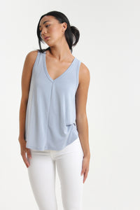 Our casual fit, v-neck tank. Elevated by a simple center front and back seam, enjoy the soft feel of this knit.  Pair it with shorts, denim jeans or trousers, for those days you simply need to "throw something on."