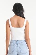 Load image into Gallery viewer, Slightly cropped for those high-waisted bottoms, this ivory colored, ribbed tank will help you achieve any effortless look. Featuring thick straps and a sweetheart neckline, easily use this staple for a dressed up or down look.
