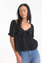 Load image into Gallery viewer, Made with a textured woven stripe, this sweetheart neckline blouse features short bubble sleeves, a tied front and smocked back detailing. With its babydoll silhouette, easily consider this a go-to piece in your wardrobe.
